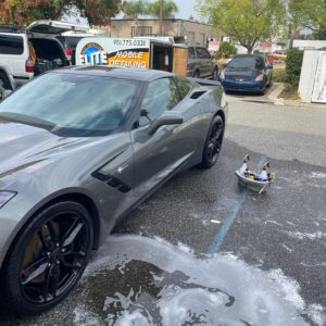 Mobile detailing of Corvette at clients office